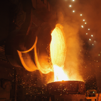 Molten steel being poured into a mold.